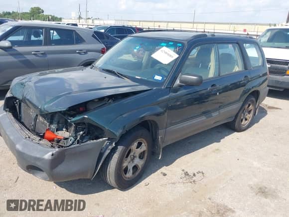 2005 Subaru Forester X with VIN JF1SG63635H700679, listed as a IAAI auction lot 42989089 with 77,512 mi miles and . Bid and sale history available at DreamBid. Image 16.
