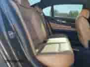 2011 BMW 7 Series with VIN WBAKX8C55BC198177, listed as a Copart auction lot 77016924 with 99,275 mi miles and Salvage title. Bid and sale history available at DreamBid. Image 10.