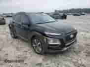 2021 Hyundai Kona Ultimate z VIN KM8K53A57MU644031, wystawiony jako Copart lot #69363535 z przebiegiem 60 943 mil mil oraz Szkoda całkowita • Salvage title. Historia ofert i sprzedaży dostępna na DreamBid. Obrazek 14.