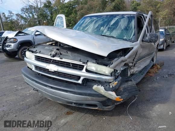 2004 Chevrolet Suburban LS z VIN 1GNFK16Z24J212700, wystawiony jako IAAI lot #41732568 z przebiegiem Nie podano mil oraz . Historia ofert i sprzedaży dostępna na DreamBid. Obrazek 17.