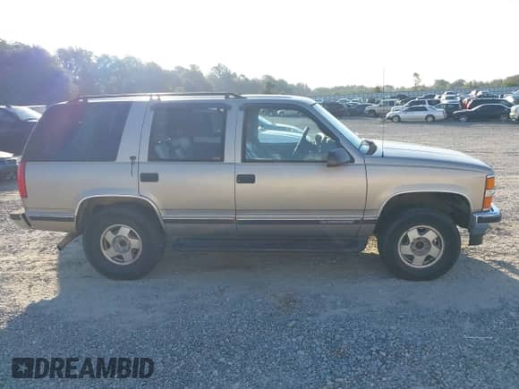 1999 Chevrolet Tahoe Z71 с VIN 1GNEK13R0XR124055, выставлен на аукционе IAAI как лот 43214218 с пробегом 142 529 миль миль и . История ставок и продаж доступна на DreamBid. Изображение 14.