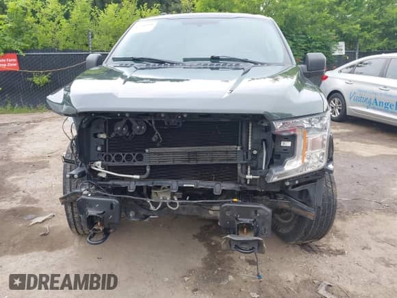 2018 Ford F-150 XL z VIN 1FTEW1EB4JKD70961, wystawiony jako IAAI lot #42481830 z przebiegiem 76 972 mil mil oraz . Historia ofert i sprzedaży dostępna na DreamBid. Obrazek 6.