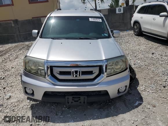 2011 Honda Pilot EX with VIN 5FNYF3H42BB043768, listed as a Copart auction lot 71052615 with 282,946 mi miles and Clean title. Bid and sale history available at DreamBid. Image 5.