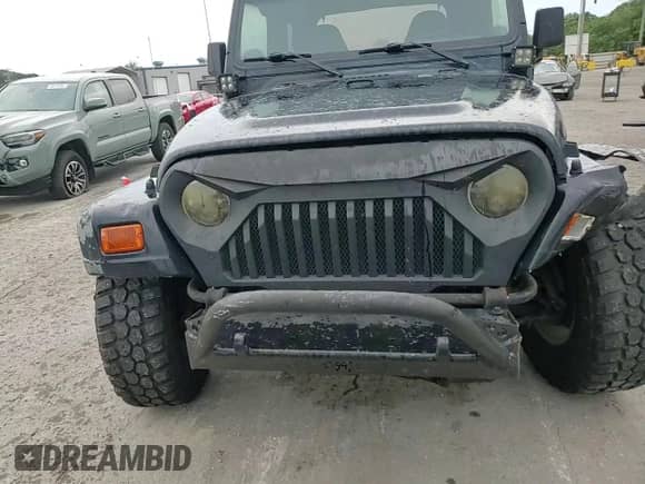 2001 Jeep Wrangler SE with VIN 1J4FA29P41P328835, listed as a Copart auction lot 68713745 with 274,578 mi miles and Clean title. Bid and sale history available at DreamBid. Image 13.