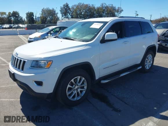 2015 Jeep Grand Cherokee Altitude z VIN 1C4RJFAG7FC122784, wystawiony jako IAAI lot #43438452 z przebiegiem 140 946 mil mil oraz . Historia ofert i sprzedaży dostępna na DreamBid. Obrazek 2.