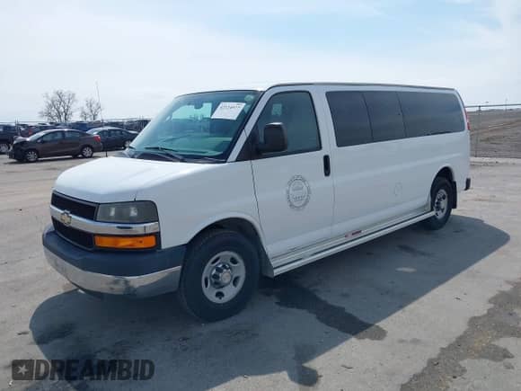 2013 Chevrolet Express Passenger 1LT with VIN 1GAZG1FA1D1191719, listed as a IAAI auction lot 42124977 with 92,228 mi miles and . Bid and sale history available at DreamBid. Image 2.