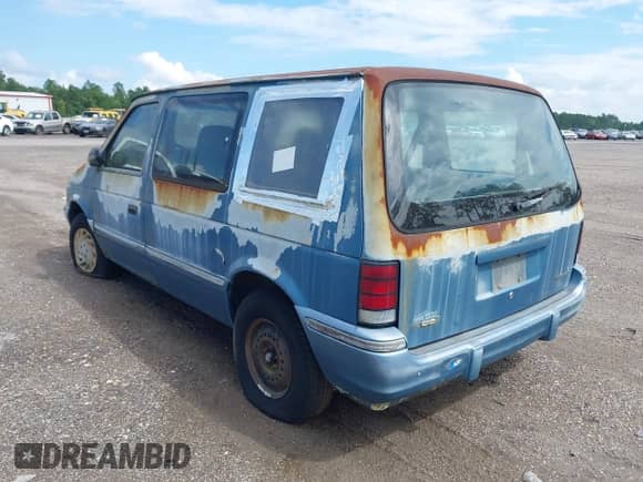 1993 Dodge Caravan with VIN 2B4GH2531PR318549, listed as a IAAI auction lot 43032590 with 245,192 mi miles and . Bid and sale history available at DreamBid. Image 3.