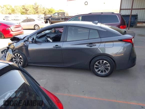 2022 Toyota Prius Nightshade with VIN JTDKAMFU4N3155017, listed as a IAAI auction lot 43013402 with 146,084 mi miles and . Bid and sale history available at DreamBid. Image 15.