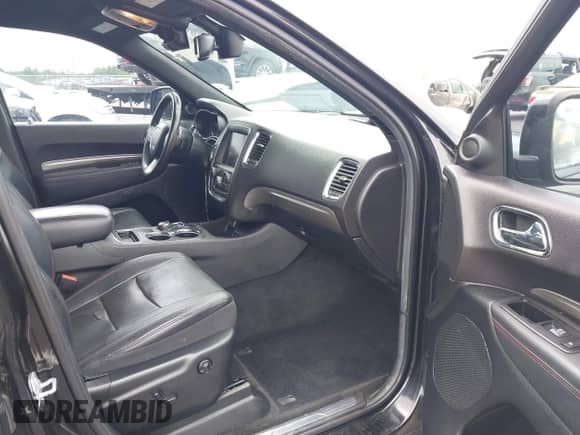 2014 Dodge Durango R/T with VIN 1C4SDHCT2EC313395, listed as a IAAI auction lot 42958438 with 113,110 mi miles and . Bid and sale history available at DreamBid. Image 5.