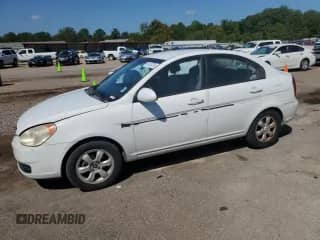 2006 Hyundai Accent GLS z VIN KMHCN46C66U051569, wystawiony jako Copart lot #69154735 z przebiegiem 210 214 mil mil oraz Czysty tytuł • Clean title. Historia ofert i sprzedaży dostępna na DreamBid. Obrazek 1.