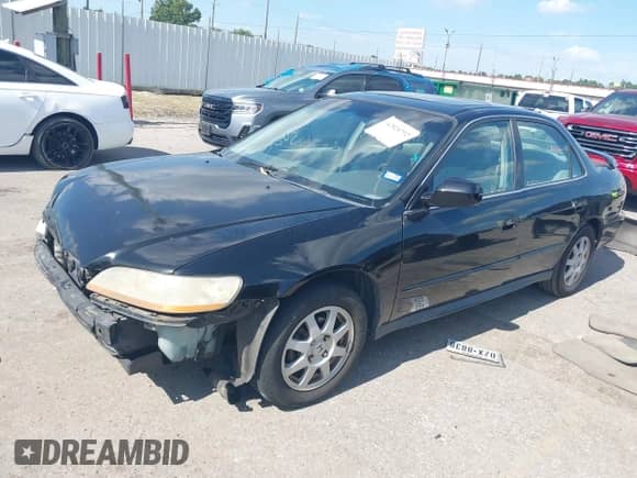 2002 Honda Accord SE z VIN 1HGCG66852A034121, wystawiony jako IAAI lot #42820792 z przebiegiem 220 120 mil mil oraz . Historia ofert i sprzedaży dostępna na DreamBid. Obrazek 18.