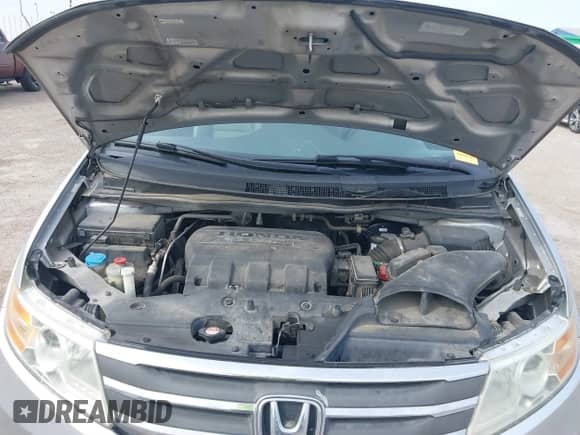 2013 Honda Odyssey EX-L z VIN 5FNRL5H69DB022042, wystawiony jako IAAI lot #41902796 z przebiegiem 178 198 mil mil oraz . Historia ofert i sprzedaży dostępna na DreamBid. Obrazek 10.