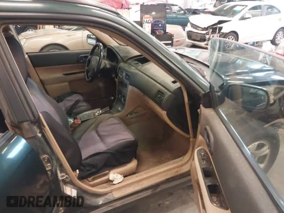 2003 Subaru Forester X with VIN JF1SG63633H747840, listed as a IAAI auction lot 40416454 with 185,632 mi miles and . Bid and sale history available at DreamBid. Image 5.