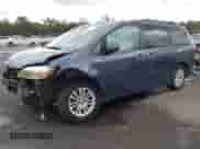 2015 Toyota Sienna XLE with VIN 5TDYK3DC4FS680798, listed as a IAAI auction lot 43296949 with 125,289 mi miles and . Bid and sale history available at DreamBid. Image 2.