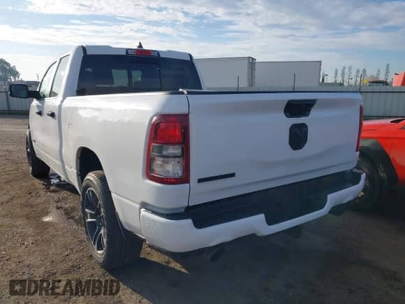 2023 Ram 1500 Lone Star z VIN 1C6RREBT8PN553095, wystawiony jako IAAI lot #41647688 z przebiegiem 18 574 mil mil oraz . Historia ofert i sprzedaży dostępna na DreamBid. Obrazek 3.