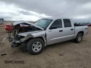 2007 Dodge Dakota SLT with VIN 1D7HW48N77S110606, listed as a Copart auction lot 48617905 with 234,017 mi miles and Salvage title. Bid and sale history available at DreamBid. Image 1.