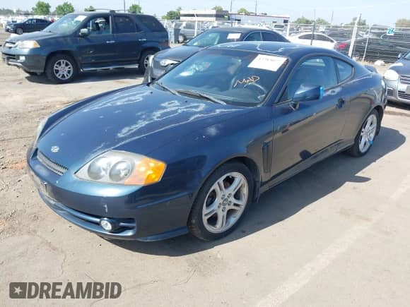 2003 Hyundai Tiburon GT с VIN KMHHN65F83U034197, выставлен на аукционе IAAI как лот 42383077 с пробегом 138 877 миль миль и . История ставок и продаж доступна на DreamBid. Изображение 2.
