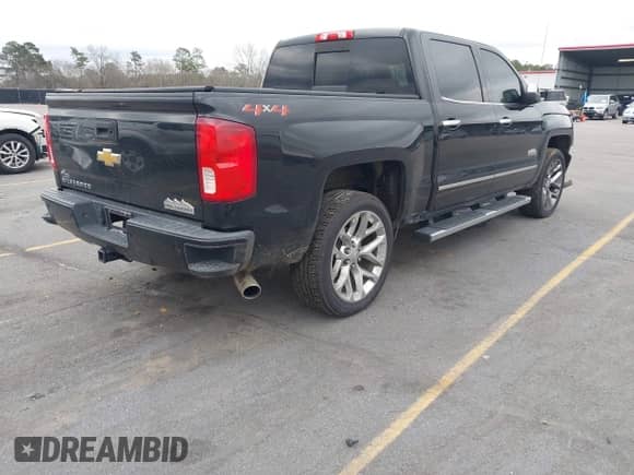 2018 Chevrolet Silverado 1500 High Country z VIN 3GCUKTEJ6JG178894, wystawiony jako IAAI lot #41606265 z przebiegiem 148 068 mil mil oraz . Historia ofert i sprzedaży dostępna na DreamBid. Obrazek 4.