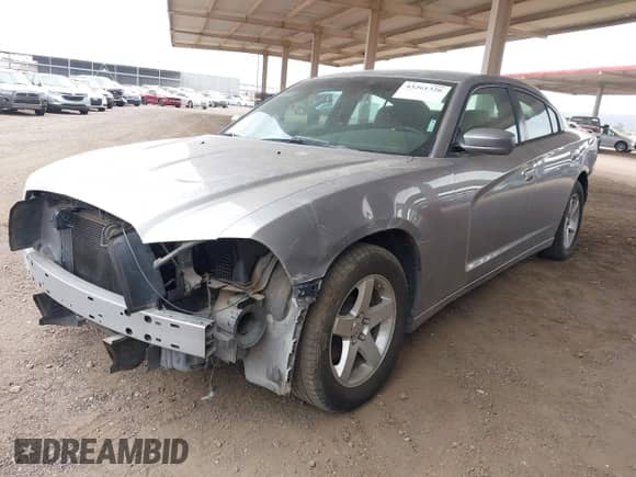 2014 Dodge Charger SE with VIN 2C3CDXBG9EH309140, listed as a IAAI auction lot 43261326 with 105,373 mi miles and . Bid and sale history available at DreamBid. Image 2.