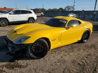 2014 Dodge Viper GTS with VIN 1C3ADEBZ2EV100035, listed as a Copart auction lot 42900805 with 23,409 mi miles and Salvage title. Bid and sale history available at DreamBid. Image 1.