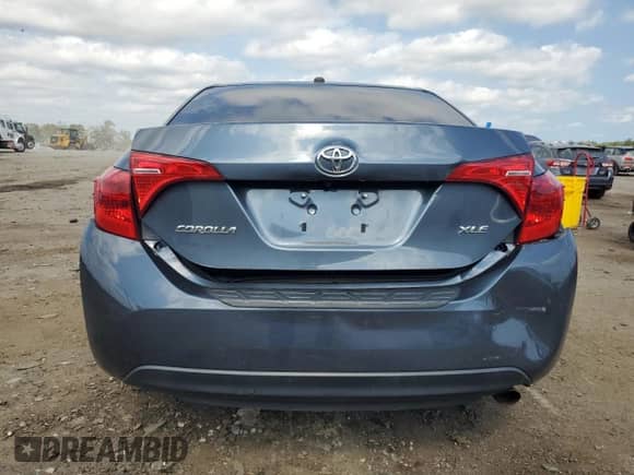 2019 Toyota Corolla XLE z VIN 2T1BURHE8KC171802, wystawiony jako Copart lot #81574345 z przebiegiem 127 477 mil mil oraz Szkoda całkowita • Salvage title. Historia ofert i sprzedaży dostępna na DreamBid. Obrazek 6.