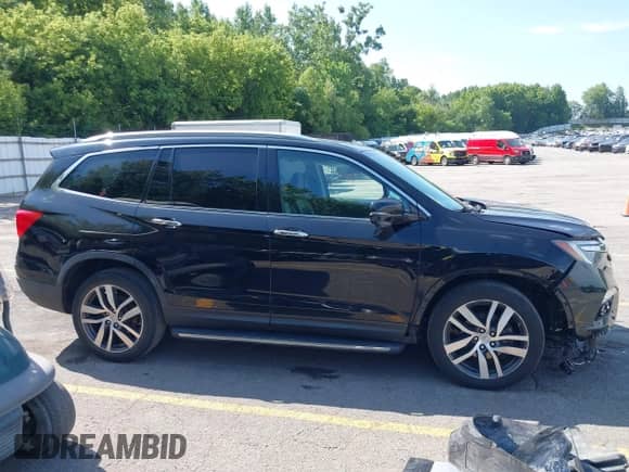 2016 Honda Pilot Touring z VIN 5FNYF6H90GB092116, wystawiony jako IAAI lot #42819445 z przebiegiem 204 693 mil mil oraz . Historia ofert i sprzedaży dostępna na DreamBid. Obrazek 13.