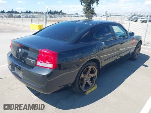 2010 Dodge Charger SXT with VIN 2B3CA3CV6AH227582, listed as a IAAI auction lot 43196146 with 198,848 mi miles and . Bid and sale history available at DreamBid. Image 4.
