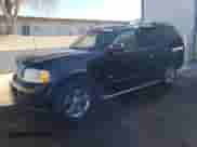 2003 Ford Explorer Limited with VIN 1FMDU75K13ZB31975, listed as a Copart auction lot 83894734 with 311,881 mi miles and Salvage title. Bid and sale history available at DreamBid. Image 1.