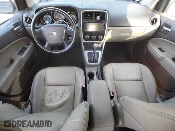 2011 Dodge Caliber Uptown with VIN 1B3CB9HB0BD110805, listed as a Copart auction lot 77849663 with 98,328 mi miles and Non repairable. Bid and sale history available at DreamBid. Image 8.