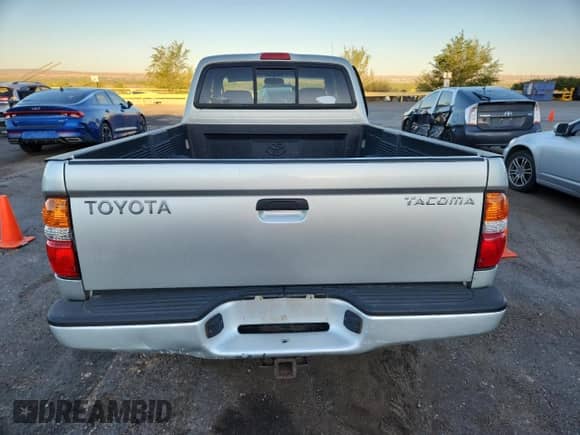 2003 Toyota Tacoma с VIN 5TEWN72NX3Z169900, выставлен на аукционе Copart как лот 80575545 с пробегом Не указан миль и Списание • Salvage title. История ставок и продаж доступна на DreamBid. Изображение 6.