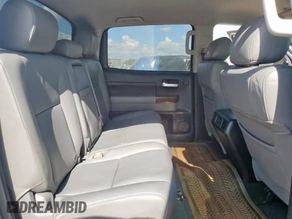 2013 Toyota Tundra Platinum с VIN 5TFFY5F10DX145553, выставлен на аукционе Copart как лот 82311405 с пробегом 142 592 миль миль и Списание • Salvage title. История ставок и продаж доступна на DreamBid. Изображение 10.