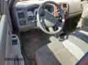 2005 Dodge Dakota SLT with VIN 1D7HE42K85S327595, listed as a Copart auction lot 64880935 with 135,771 mi miles and Salvage title. Bid and sale history available at DreamBid. Image 8.