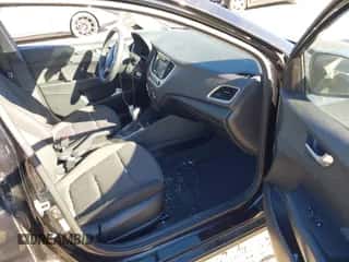 2019 Hyundai Accent SE z VIN 3KPC24A31KE065389, wystawiony jako IAAI lot #43342974 z przebiegiem 52 352 mil mil oraz . Historia ofert i sprzedaży dostępna na DreamBid. Obrazek 5.