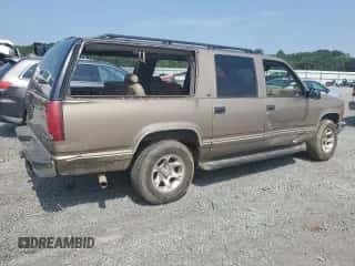 1996 Chevrolet Suburban с VIN 3GNFK16RXTG134506, выставлен на аукционе Copart как лот 66698144 с пробегом 227 266 миль миль и Списание • Salvage title. История ставок и продаж доступна на DreamBid. Изображение 3.