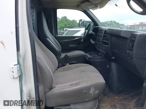 2011 Chevrolet Express Cargo with VIN 1GCWGFCA4B1172655, listed as a IAAI auction lot 42451763 with 326,327 mi miles and . Bid and sale history available at DreamBid. Image 5.