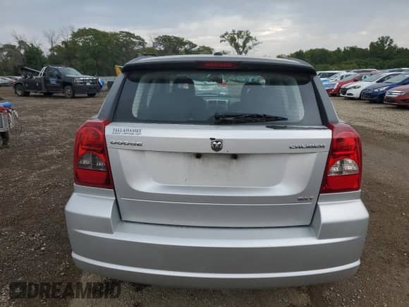 2009 Dodge Caliber SXT z VIN 1B3HB48AX9D181259, wystawiony jako Copart lot #80146215 z przebiegiem 94 695 mil mil oraz Szkoda całkowita • Salvage title. Historia ofert i sprzedaży dostępna na DreamBid. Obrazek 6.