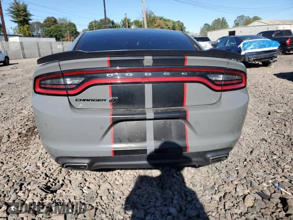 2019 Dodge Charger SXT with VIN 2C3CDXJG1KH710646, listed as a Copart auction lot 84826025 with 74,026 mi miles and Salvage title. Bid and sale history available at DreamBid. Image 6.