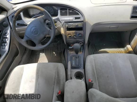 2003 Hyundai Elantra GLS z VIN KMHDN45D63U595788, wystawiony jako Copart lot #59692984 z przebiegiem 119 573 mil mil oraz Szkoda całkowita • Salvage title. Historia ofert i sprzedaży dostępna na DreamBid. Obrazek 8.