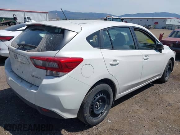 2020 Subaru Impreza with VIN 4S3GTAB6XL3732197, listed as a IAAI auction lot 42489155 with 53,805 mi miles and . Bid and sale history available at DreamBid. Image 4.