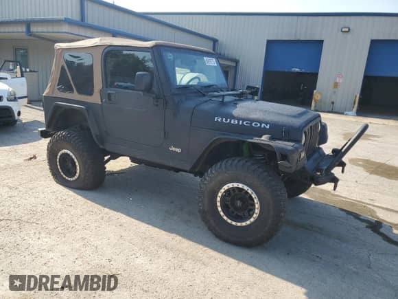 2003 Jeep Wrangler Rubicon с VIN 1J4FA69S23P310588, выставлен на аукционе Copart как лот 66919775 с пробегом 106 685 миль миль и Списание • Salvage title. История ставок и продаж доступна на DreamBid. Изображение 4.