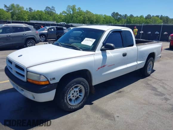 1999 Dodge Dakota SLT с VIN 1B7GL22X0XS193423, выставлен на аукционе IAAI как лот 42053562 с пробегом 209 802 миль миль и . История ставок и продаж доступна на DreamBid. Изображение 2.