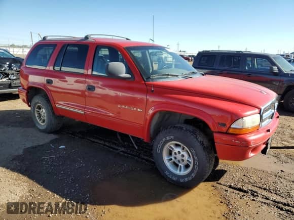 1999 Dodge Durango with VIN 1B4HS28Z6XF531817, listed as a Copart auction lot 84390975 with 227,778 mi miles and Clean title. Bid and sale history available at DreamBid. Image 4.