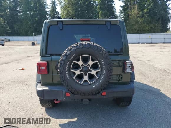 2021 Jeep Wrangler Unlimited Rubicon with VIN 1C4HJXFG0MW712699, listed as a Copart auction lot 71430755 with Not provided miles and Salvage title. Bid and sale history available at DreamBid. Image 6.