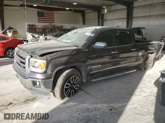2014 GMC Sierra 1500 SLT z VIN 3GTU2VEC4EG476394, wystawiony jako Copart lot #83988315 z przebiegiem Nie podano mil oraz Szkoda całkowita • Salvage title. Historia ofert i sprzedaży dostępna na DreamBid. Obrazek 1.