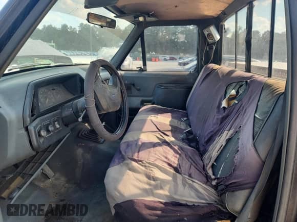 1989 Ford F-150 with VIN 1FTEF15Y8KNA26117, listed as a Copart auction lot 71691125 with 50,687 mi miles and Salvage title. Bid and sale history available at DreamBid. Image 7.