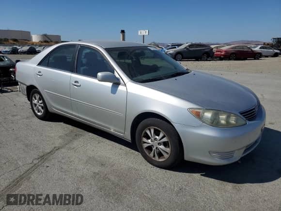 2005 Toyota Camry XLE с VIN 4T1BF30K65U599363, выставлен на аукционе Copart как лот 81202785 с пробегом 116 670 миль миль и Списание • Salvage title. История ставок и продаж доступна на DreamBid. Изображение 4.