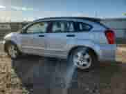 2007 Dodge Caliber SXT with VIN 1B3HB48B87D109532, listed as a Copart auction lot 82186725 with 222,900 mi miles and Salvage title. Bid and sale history available at DreamBid. Image 2.