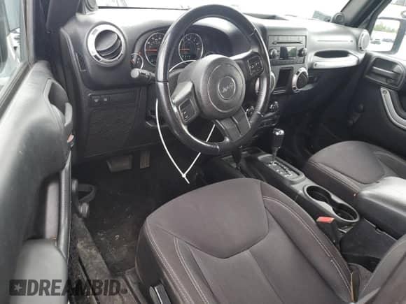 2013 Jeep Wrangler Rubicon z VIN 1C4BJWCG1DL584611, wystawiony jako Copart lot #68687555 z przebiegiem 143 063 mil mil oraz Szkoda całkowita • Salvage title. Historia ofert i sprzedaży dostępna na DreamBid. Obrazek 8.