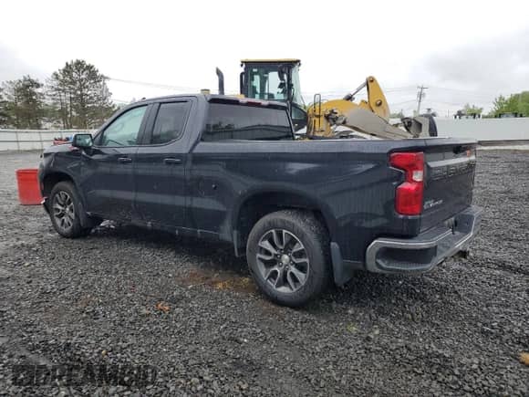 2023 Chevrolet Silverado 1500 LT with VIN 1GCRDDED9PZ250910, listed as a Copart auction lot 57414515 with 64,729 mi miles and Salvage title. Bid and sale history available at DreamBid. Image 2.