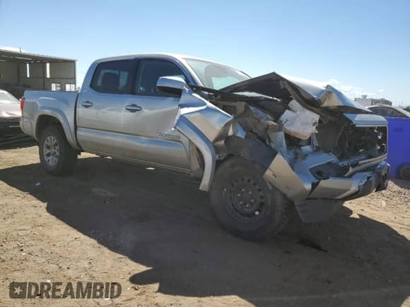 2019 Toyota Tacoma SR with VIN 3TMCZ5AN4KM197894, listed as a Copart auction lot 80353295 with 82,713 mi miles and Salvage title. Bid and sale history available at DreamBid. Image 4.